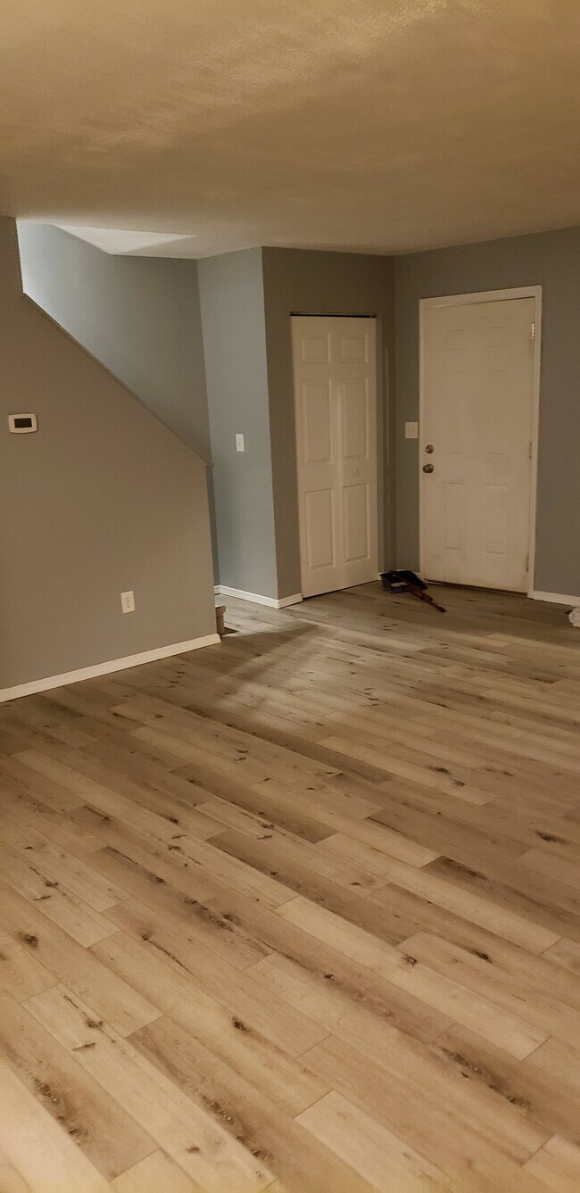 Looking at Stairs and Front Entry - 3523 S Burks Ct