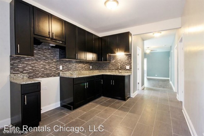 Building Photo - 3 br, 1 bath Apartment - 8739 S. Colfax Ave.