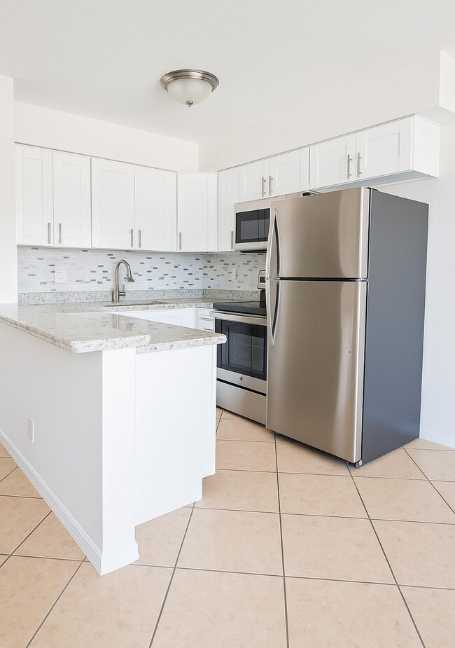 Building Photo - 4670 NE 5th Ave