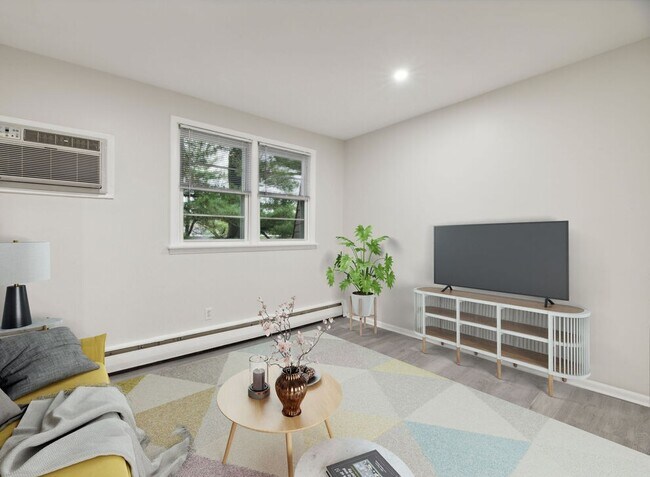 Sala de estar - Apartments At Pine Brook