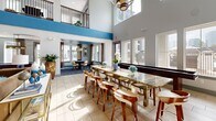 Located in the Galleria area of Houston, TX, this generously sized amenity facility spans a single floor and offers a comprehensive suite of spaces designed for both leisure and productivity. The grand clubhouse serves as the centerpiece, boasting soaring double-height ceilings, large windows that flood the space with natural light, and a striking marble-topped communal table surrounded by stylish wood barstools. A bold blue accent wall adds a vibrant touch, while an upper-level mezzanine with wrought-iron railings enhances the architectural drama. Adjacent to the main lounge is a dedicated conference room featuring a long hardwood table, modern task chairs, and refined navy ceiling accents — ideal for professional gatherings. A well-appointed business center offers built-in marble desktops, desktop workstations, and curated artwork. The fully equipped fitness center includes a comprehensive array of strength and cardio machines, mirrored walls, and patterned teal carpeting beneath ceiling fans. Outdoors, a resort-style pool area with lounge chairs and landscaping provides a relaxing retreat, while a covered brick-paved courtyard with string lights and a private terrace with plush seating round out the outdoor offerings. The campus-style layout, visible in its full complexity, reflects a thoughtfully designed community built for modern living.