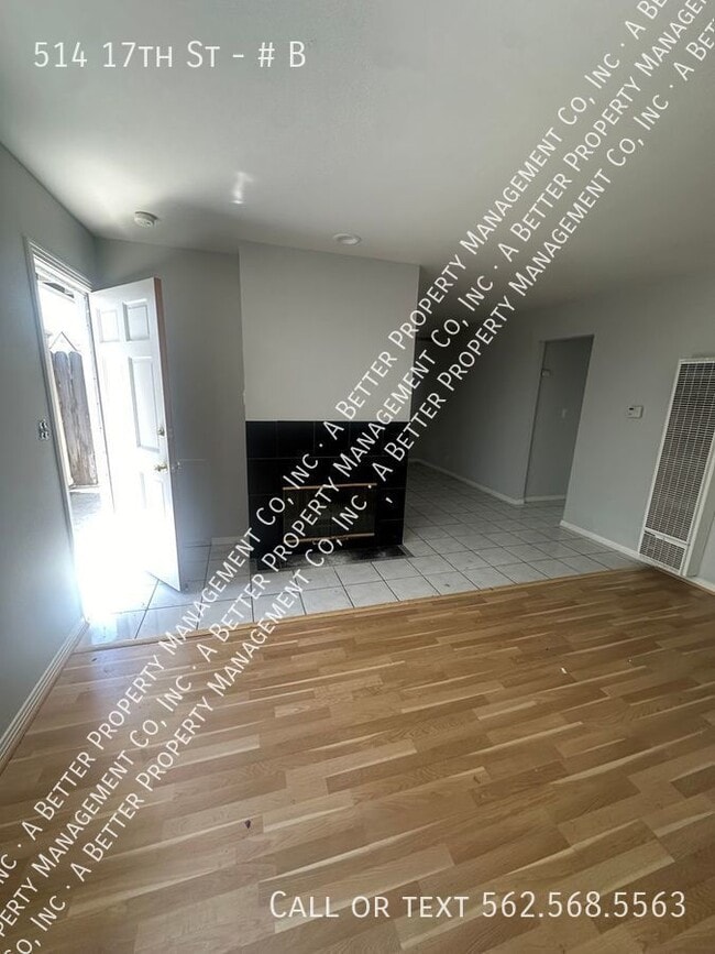 Building Photo - LARGE BACK UNIT W/PATIO - Plank Floors in ...
