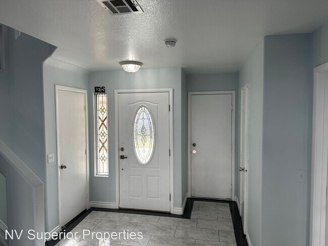 Building Photo - 4 br, 2.5 bath House - 10152 Climbing Lily...