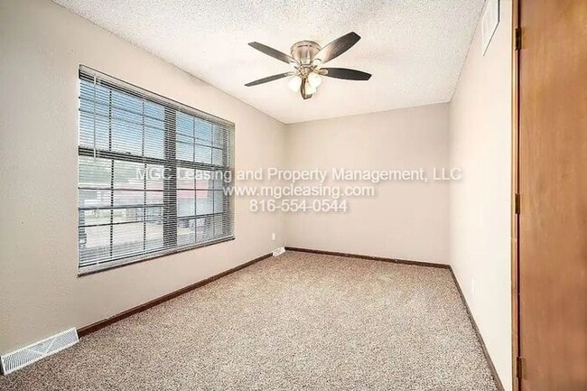 Building Photo - Millwood Townhomes - Blue Springs, MO - Reduced rent with a bonus of a brand-new 55" TV or a $250...