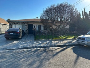 Building Photo - 5154 Santa Ana St