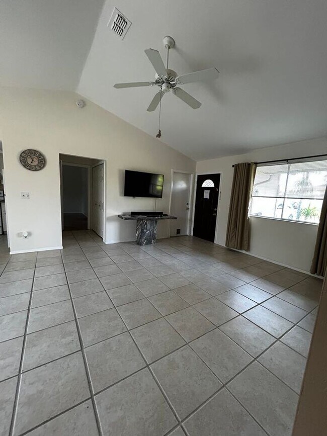 Building Photo - 3 Bedroom with large yard - Cape Coral