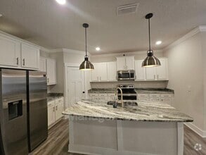 Building Photo - 6047 Twenty One Oaks Dr