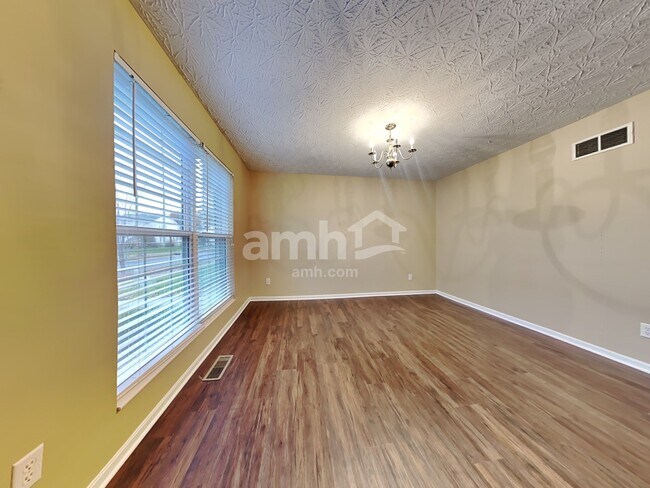 Building Photo - 8888 Woolstone Ct