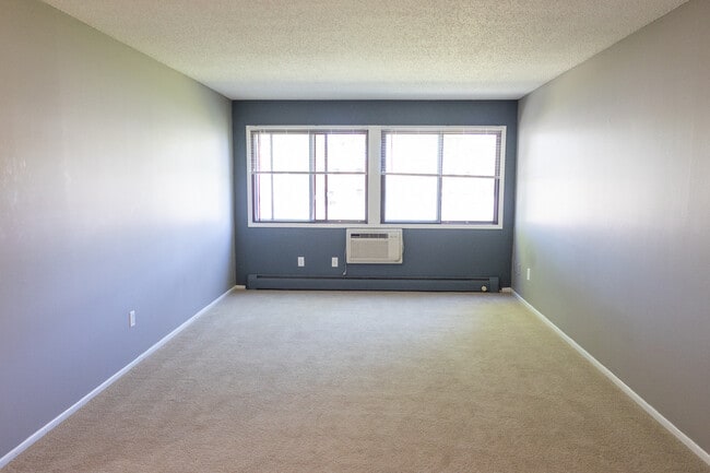 2BA/1BA - 715SF - Living Room - Centennial & Heritage Apartments