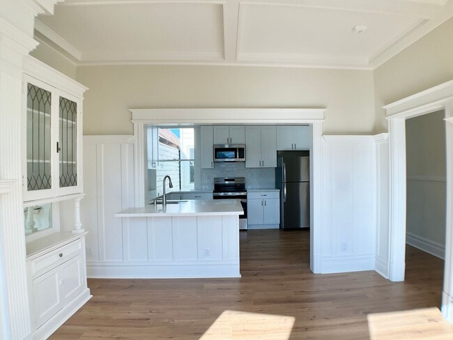 Photo - REMODELED 4BR/3BA. In Unit Laundry! Dishwasher! Bay Windows! Apartment