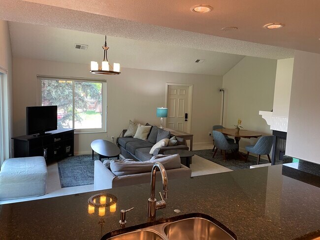 Living room, dining area & rear door to private stairwell serving only 6 units! - 4475 Laguna Pl