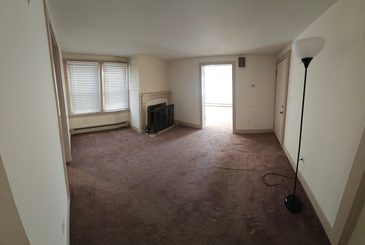Living room with fireplace - 101 Washington St