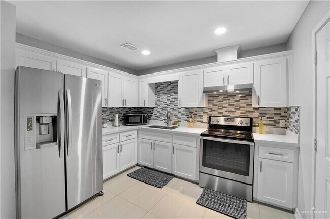 Foto del edificio - 1103 W 26th St