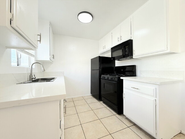 Photo - 1343 W 36th St Apartment