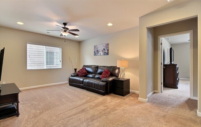 Viewing upstairs loft from top of stairs landing. Master bedroom to the right. - 8840 Jayden Dr NE