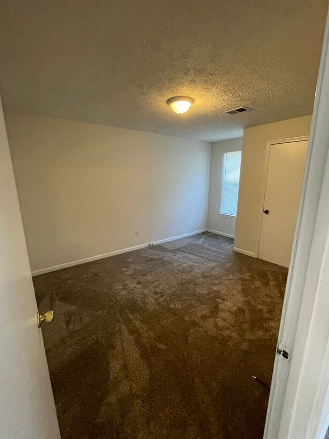 Building Photo - 6853-6853 Selman Dr