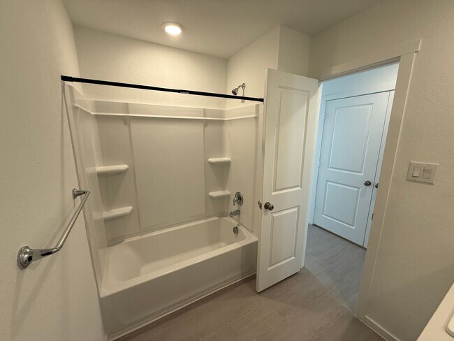 Building Photo - Brand NEW 4-bedroom, 2-bathroom home for l...