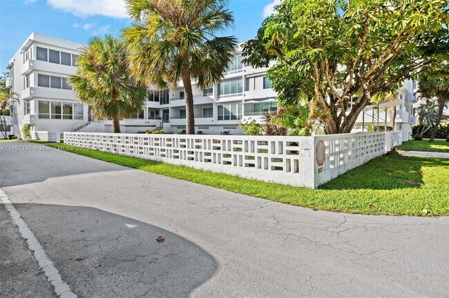 Building Photo - 10240 Collins Ave