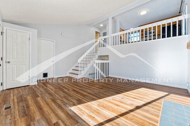 Building Photo - Beautiful Home with Fenced Back Yard and A...