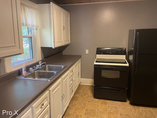 Foto del edificio - 4 br, 1 bath House - 501 E Washington