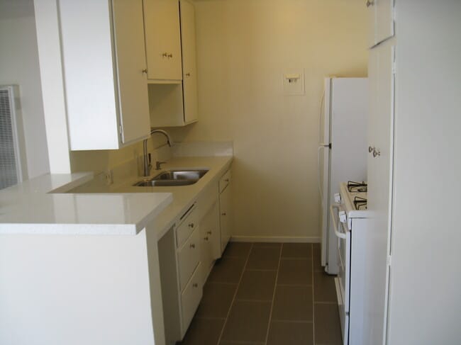 Kitchen - Malia's Apartments
