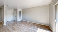 Located at 517 N Loop 288 in Denton, TX, this 2-bedroom, 2-bathroom residence offers a thoughtfully designed single-floor layout. The living room is bright and welcoming, featuring wood-look plank flooring, neutral grey walls, and a sliding glass door that opens to a private balcony with outdoor views — allowing abundant natural light to fill the space.

The galley-style kitchen is efficiently arranged and well-equipped, showcasing white cabinetry, granite-look countertops, a subway tile backsplash, stainless steel appliances including a refrigerator and range, and a double-basin sink.

Both bedrooms are carpeted for comfort and feature ceiling fans with light fixtures, blinds-covered windows that invite natural light, and neutral wall tones. The primary bedroom includes a double-door closet for ample storage.

The two bathrooms are clean and functional. One features wood-look flooring, a white vanity with a framed mirror, and brushed nickel fixtures. The second bathroom includes a tub/shower combination surrounded by elegant marble-look tile, paired with wood-look flooring for a cohesive finish.

A connecting hallway ties the layout together efficiently. The overall aesthetic is clean, modern, and move-in ready, making this residence a practical and comfortable option in Denton, TX.