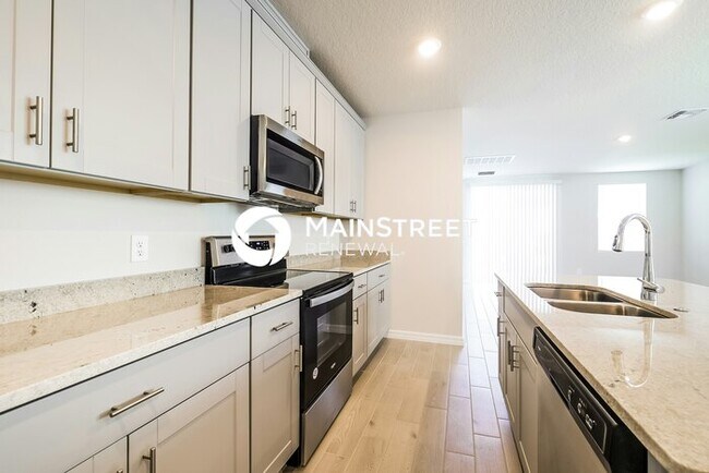 Building Photo - 4 Bedroom Pet-Friendly Home in Davenport, FL with Main Street Renewal