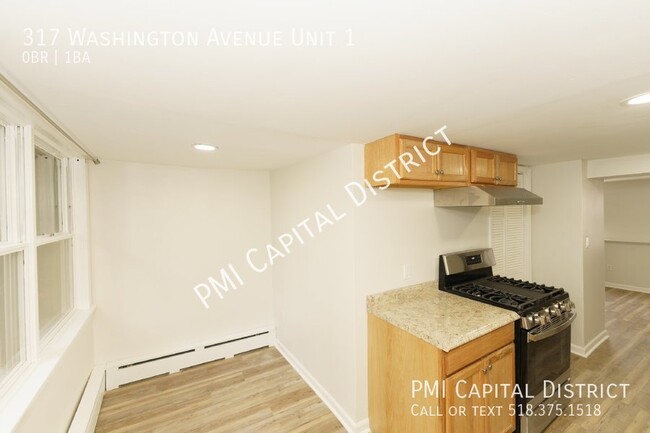 Building Photo - Heat and Hot Water Included!  Updated Stud...