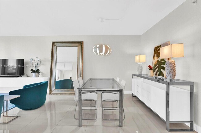 Building Photo - 10275 Collins Ave