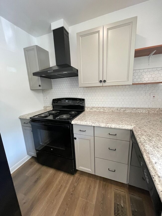 Building Photo - Coming Soon! Remodeled and ready to be you...