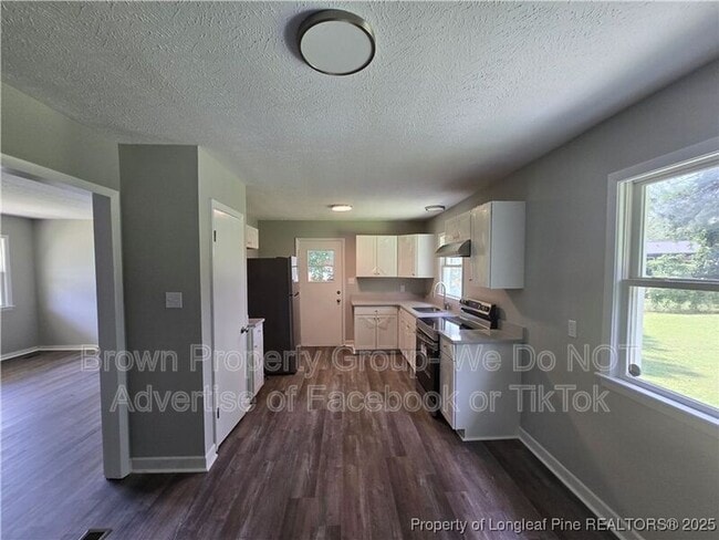 Foto del edificio - 303 Cartwright Dr