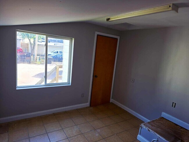 Building Photo - 106 7th Ave S