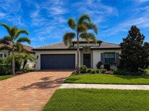 Building Photo - 6160 Harmony Dr