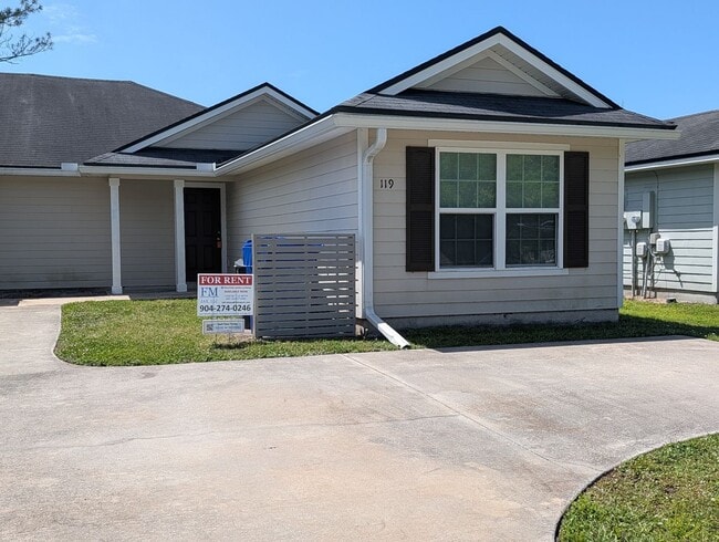 Building Photo - NOW AVAILABLE - 3/2 Duplex on this 18 mo Lease - Conveniently located off Lewis Speedway near St ...