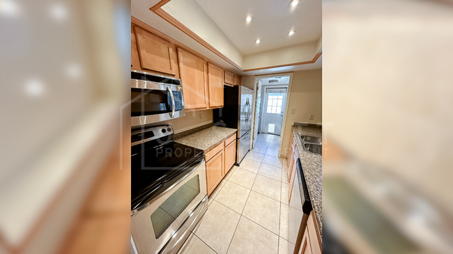 Building Photo - Beautifully Updated 2-Bedroom Condominium ...