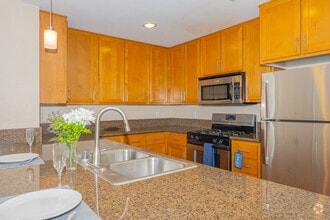2BR-2BA-1,040SF-Carpet-Kitchen - Six1Five