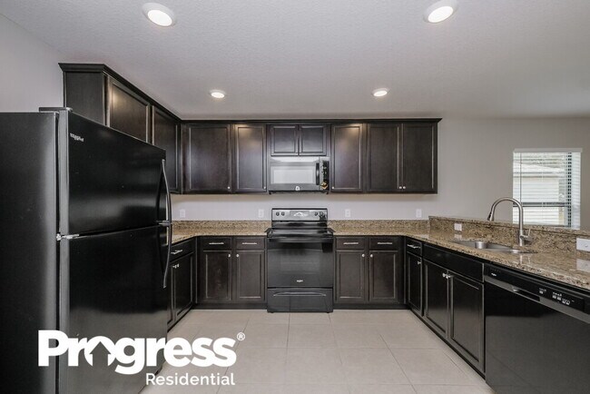Building Photo - 6760 Redbay Dr