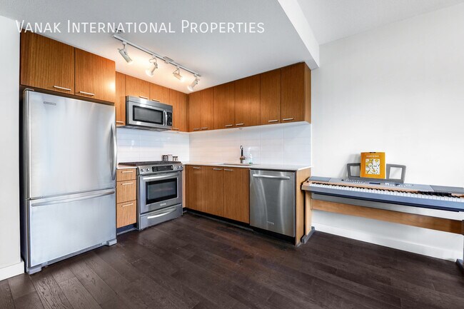 Building Photo - Modern Studio with Balcony, View & Parking...