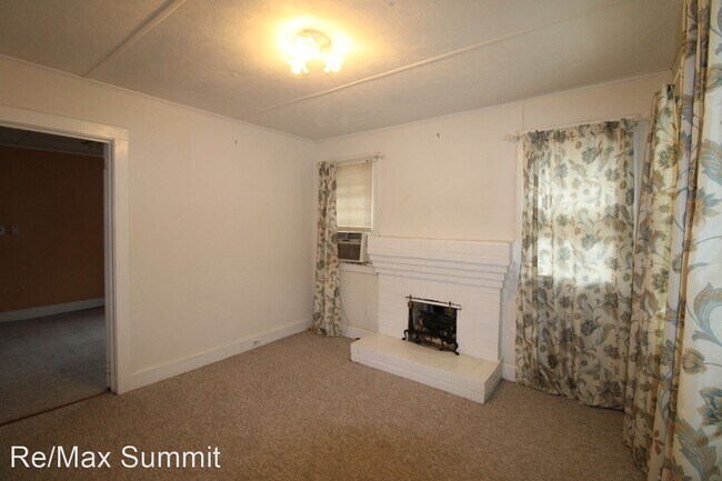 Foto del edificio - 4 br, 1 bath House - 812 S. Main Street