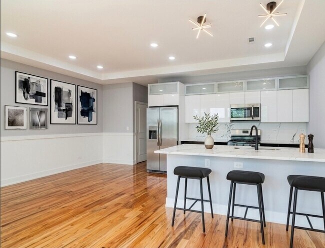 Foto del edificio - 6334 S Langley Ave
