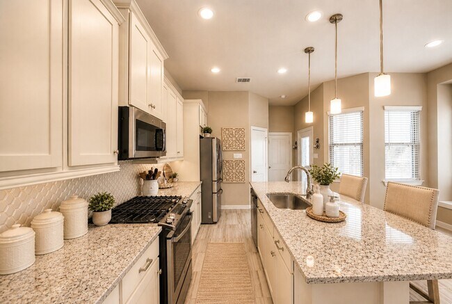Foto del edificio - 6110 Dovetail Cliff Ct