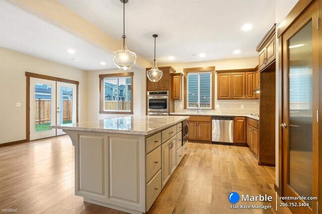 Building Photo - 5 br, 3 bath House - 13128 123rd Avenue Ct E