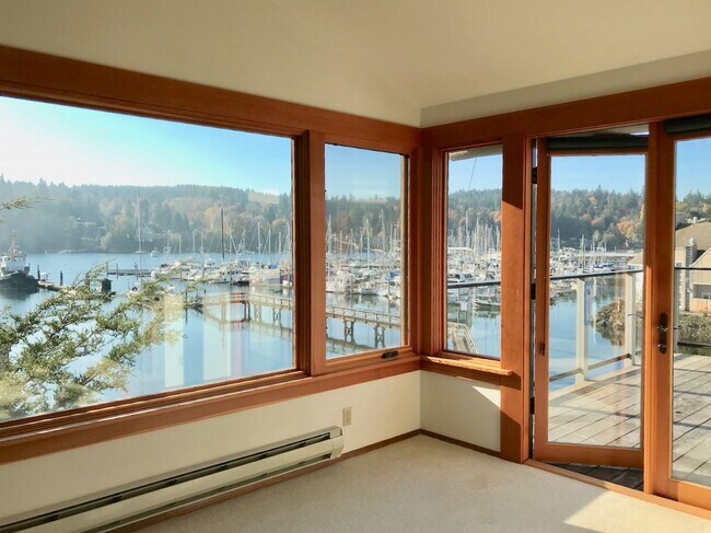 Building Photo - Boutique in town condo building with luxury top floor waterfront unit....now available