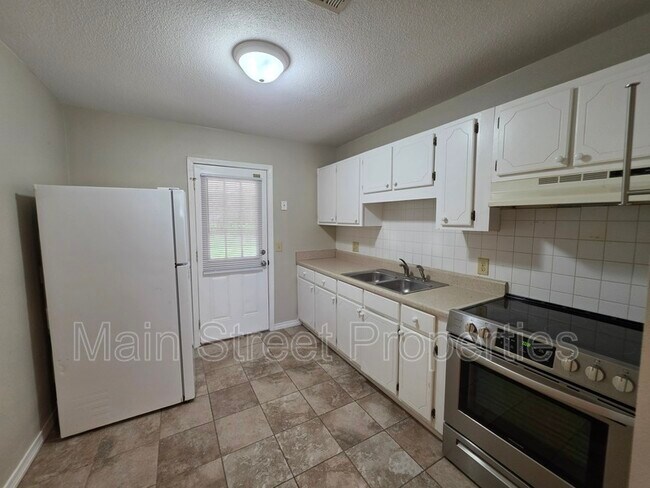 Building Photo - 7816 Sabra Dr
