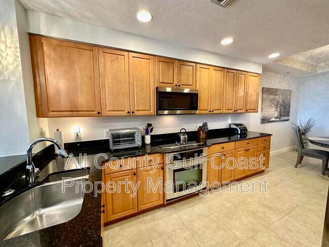Building Photo - 611 Riviera Dunes Way Apt 207