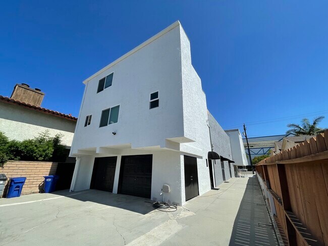 #4 is the windows above garage - 423 N Elena Ave