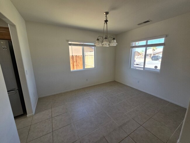Building Photo - Fresh Paint and New Flooring Coming Soon!