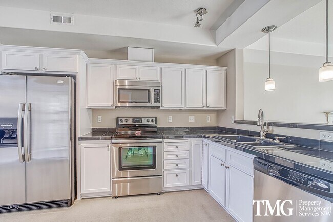 Building Photo - Bright & Open Living in Tanasbourne Tech Corridor