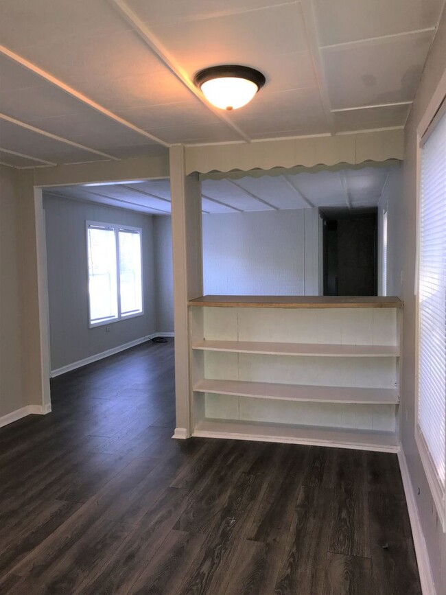 Building Photo - Clean, Updated, and Cozy Living Just Waiti...