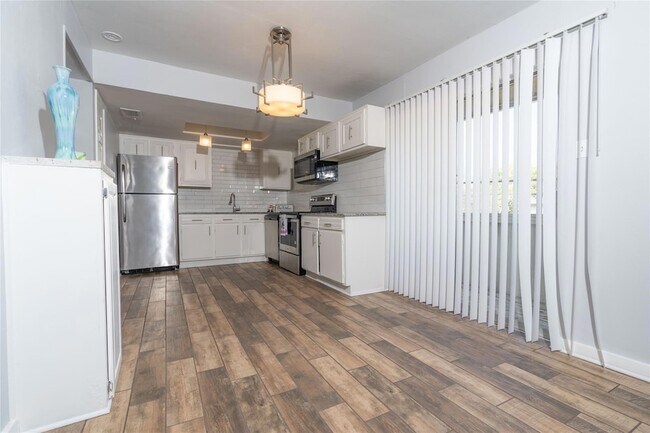Building Photo - 5603 Harvest Hill Road Unit 2003B